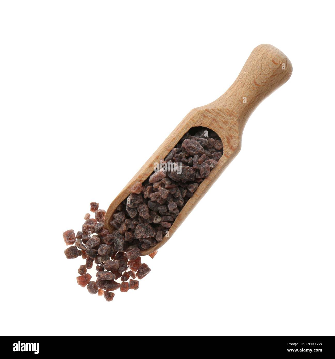Black salt in wooden scoop on white background, top view Stock Photo