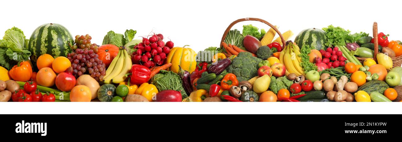 Collection of fresh organic vegetables and fruits on white background
