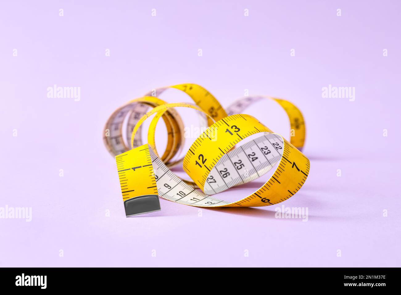 Female hands using wooden tailor ruler to measure cotton fabric. Textile  sale and sewing concept Stock Photo - Alamy