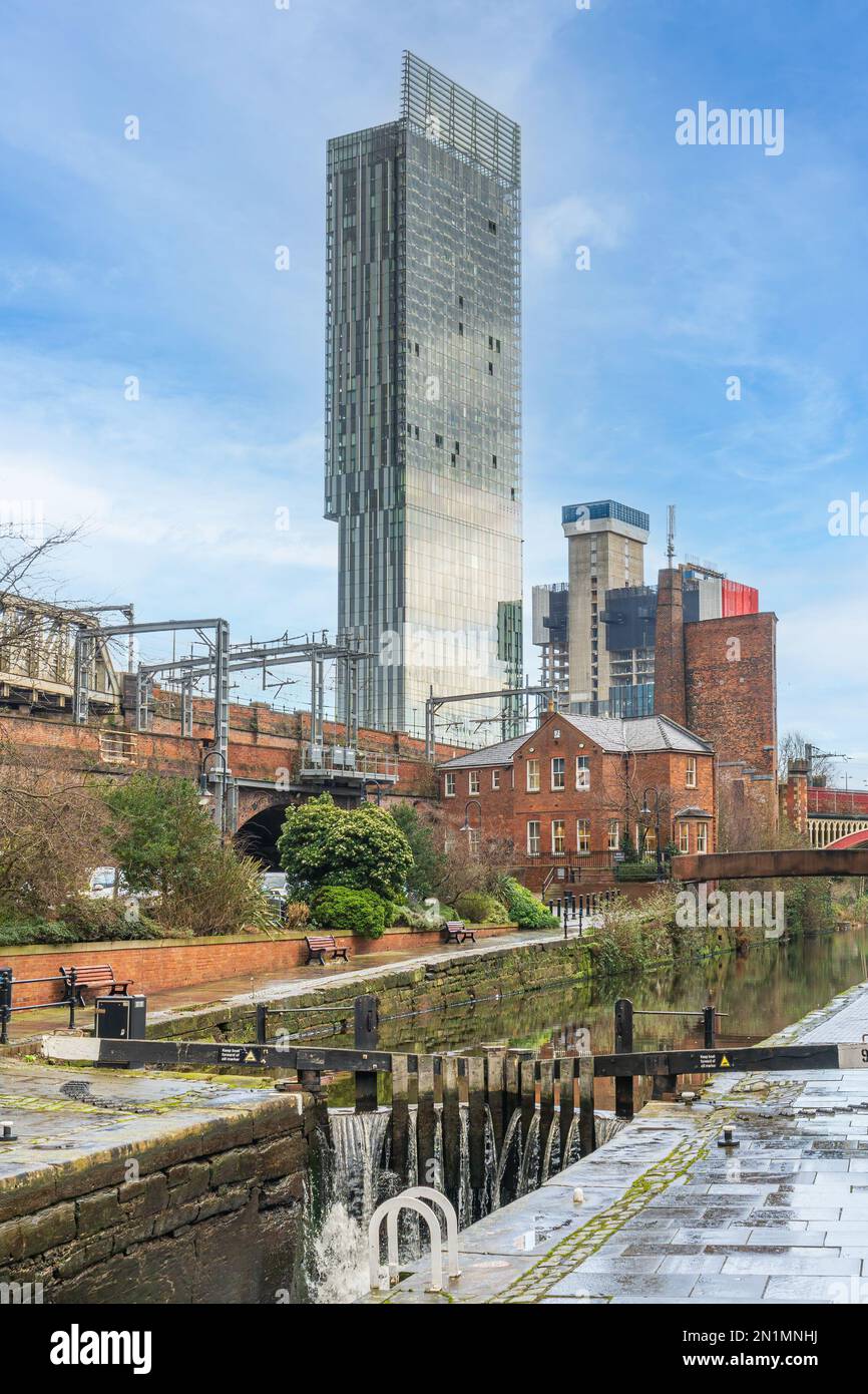 Looking along the tow path on the Rochdale Canal towards the Beetham Tower Stock Photo