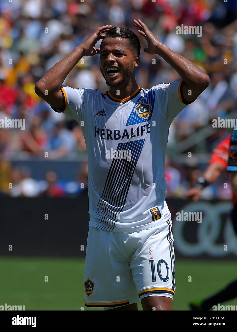 Los Angeles Galaxy midfielder Giovani Dos Santos reacts after missing a ...