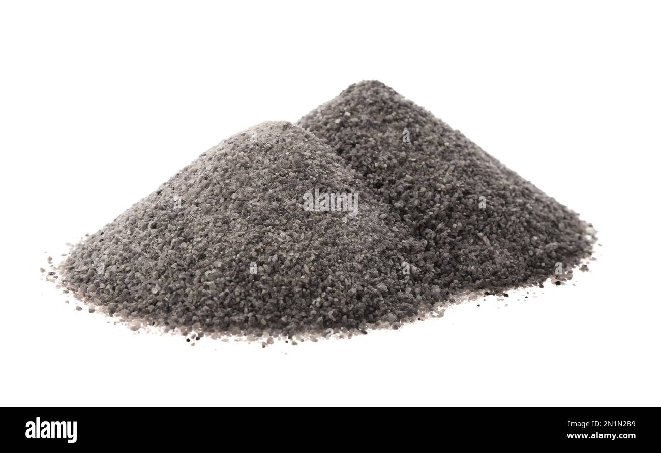 Piles of ground black salt isolated on white Stock Photo