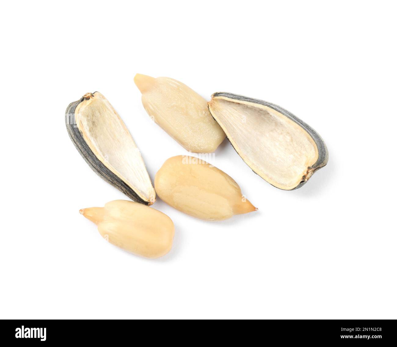 Raw peeled sunflower seeds and shell isolated on white Stock Photo - Alamy