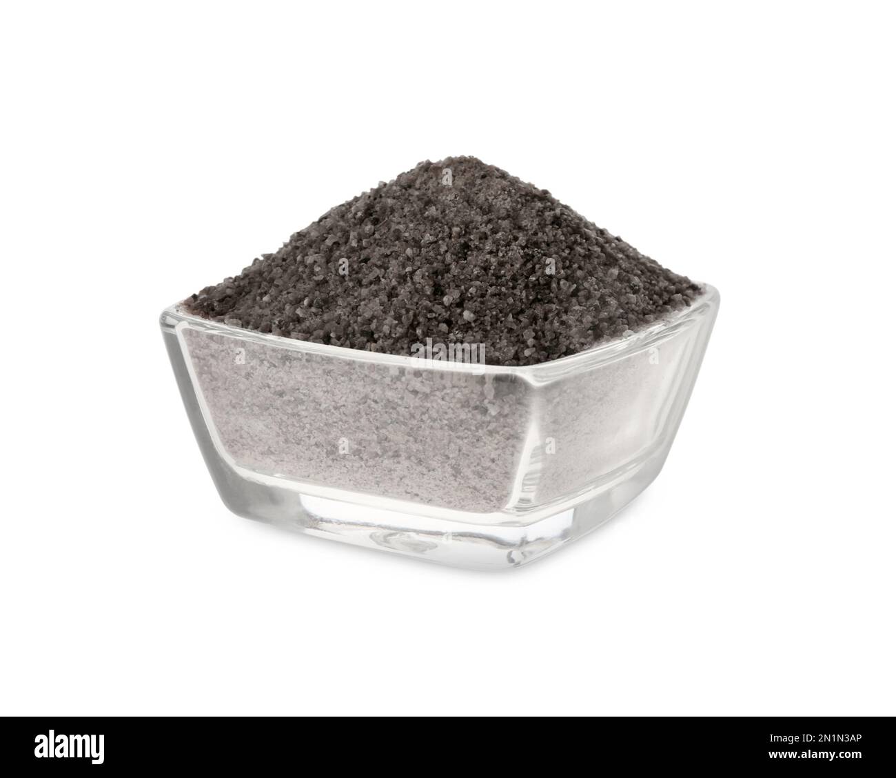Ground black salt in bowl isolated on white Stock Photo