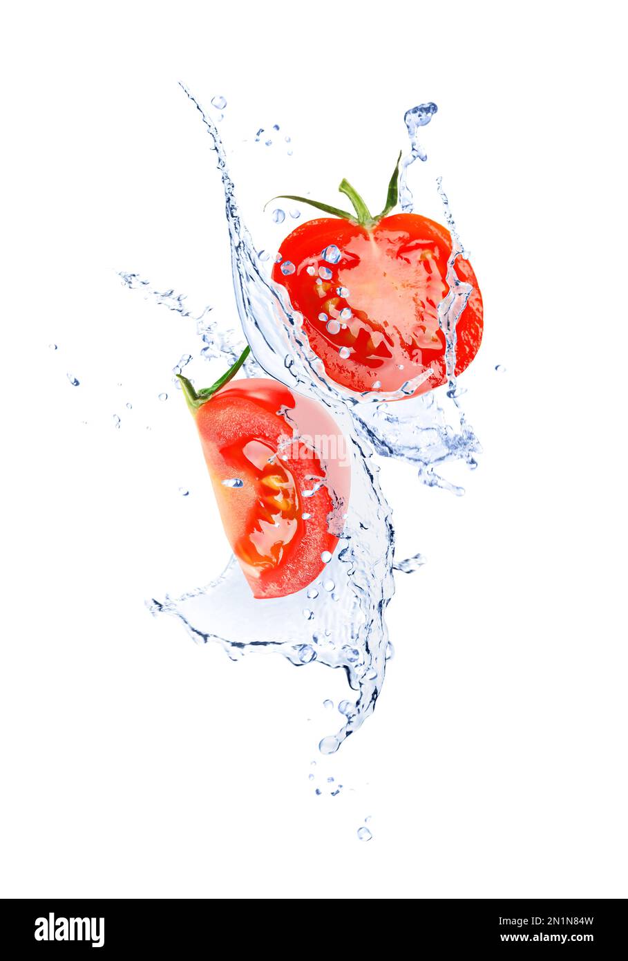 Fresh cut tomatoes with water splash on white background Stock Photo ...