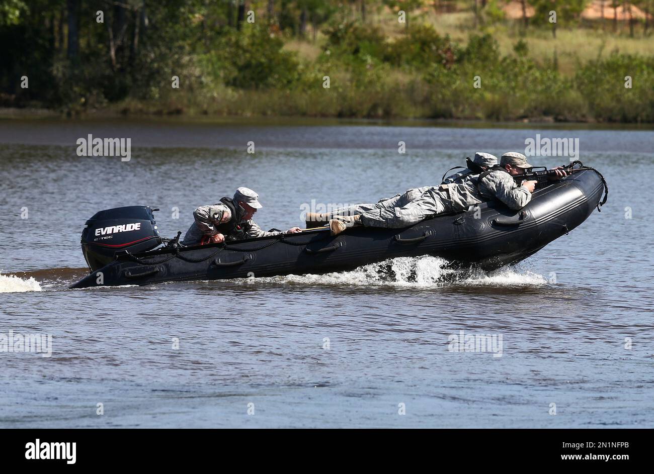 U.S. Army rangers demonstrates watercraft skills during a Army Ranger ...