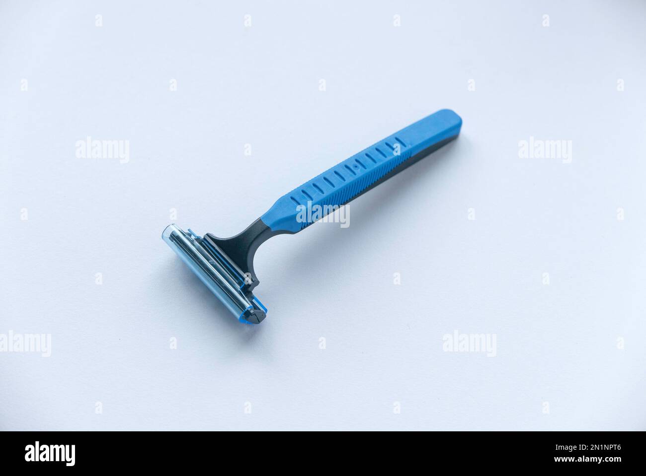 Disposable razor isolated on a white background. Stock Photo