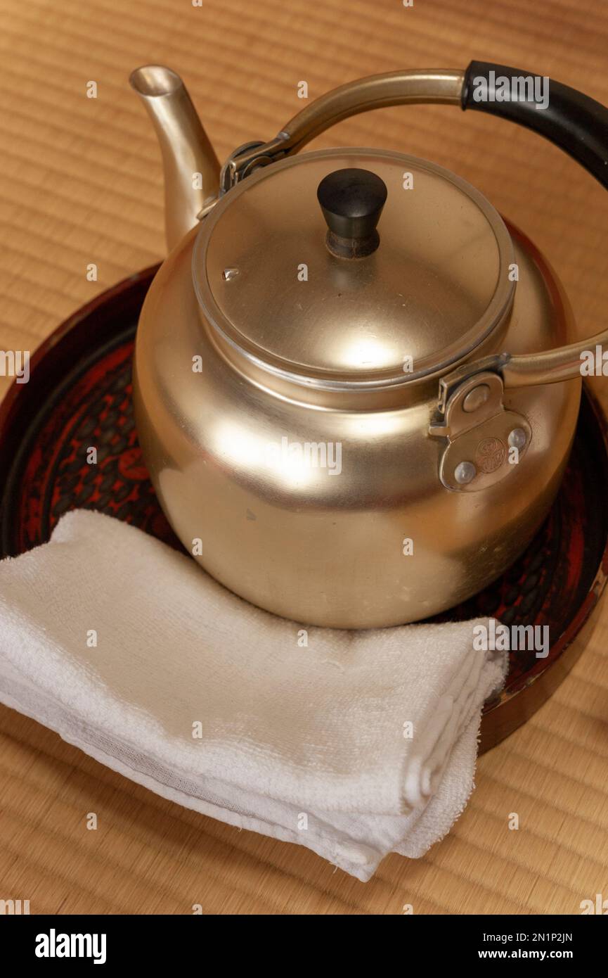 A kettle of tea is served at the shojin ryori Buddhist breakfast at