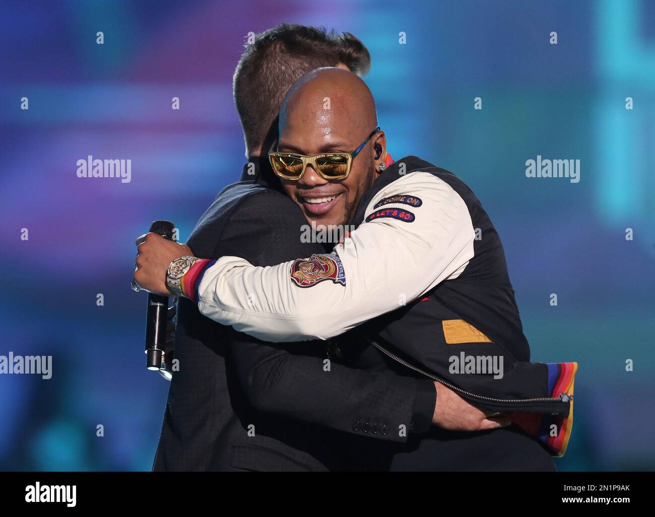 Robin Thicke, left, and Flo Rida perform “I Don’t Like It, I Love It ...