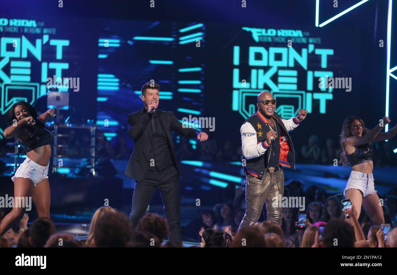 Robin Thicke, left, and Flo Rida perform “I Don’t Like It, I Love It ...