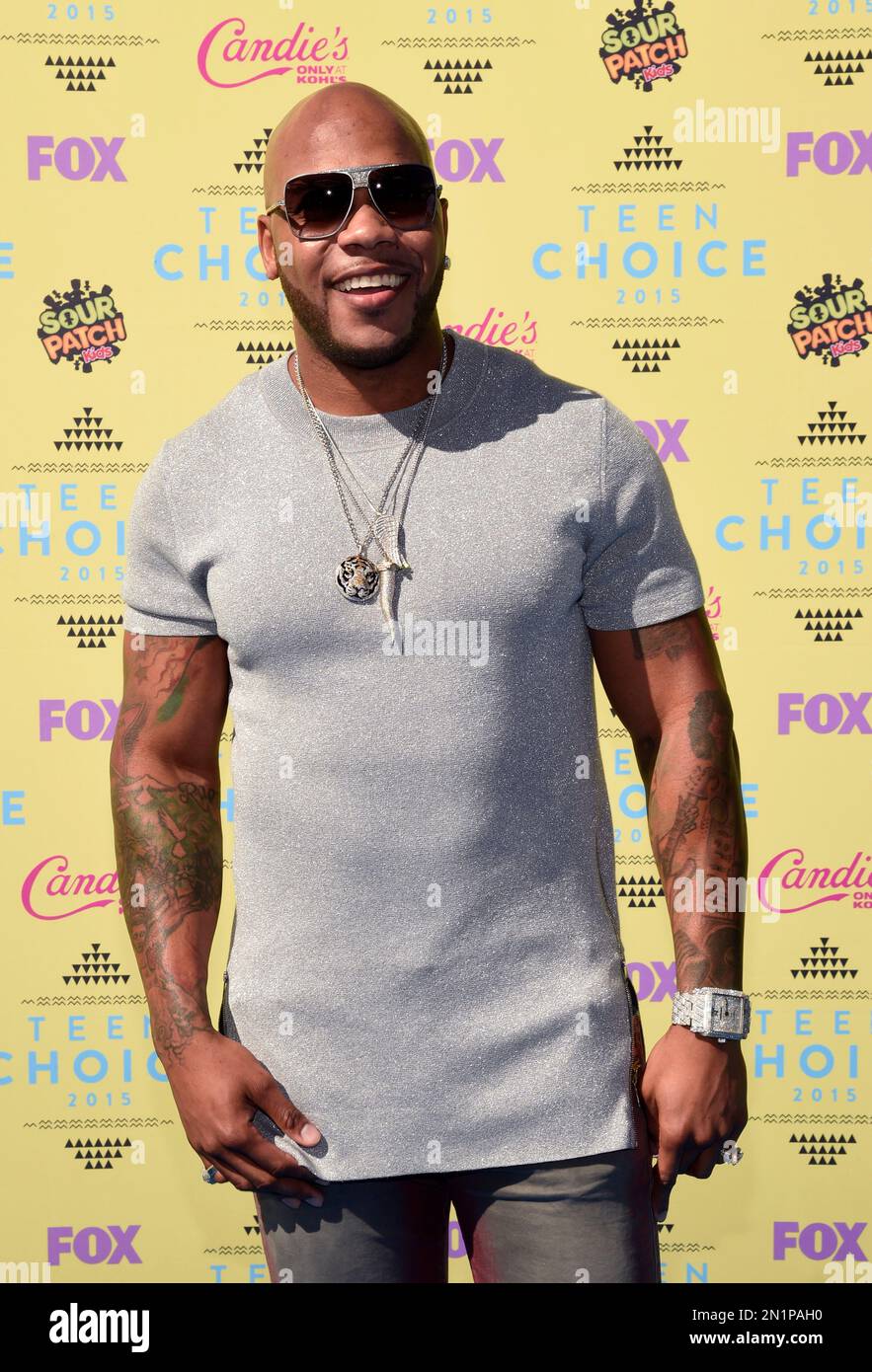 Flo Rida arrives at the Teen Choice Awards at the Galen Center on ...