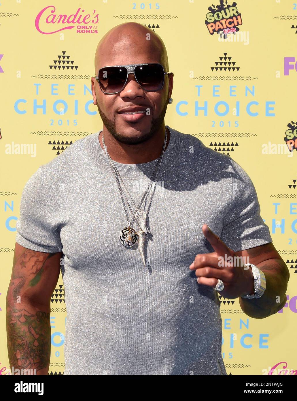Flo Rida arrives at the Teen Choice Awards at the Galen Center on ...