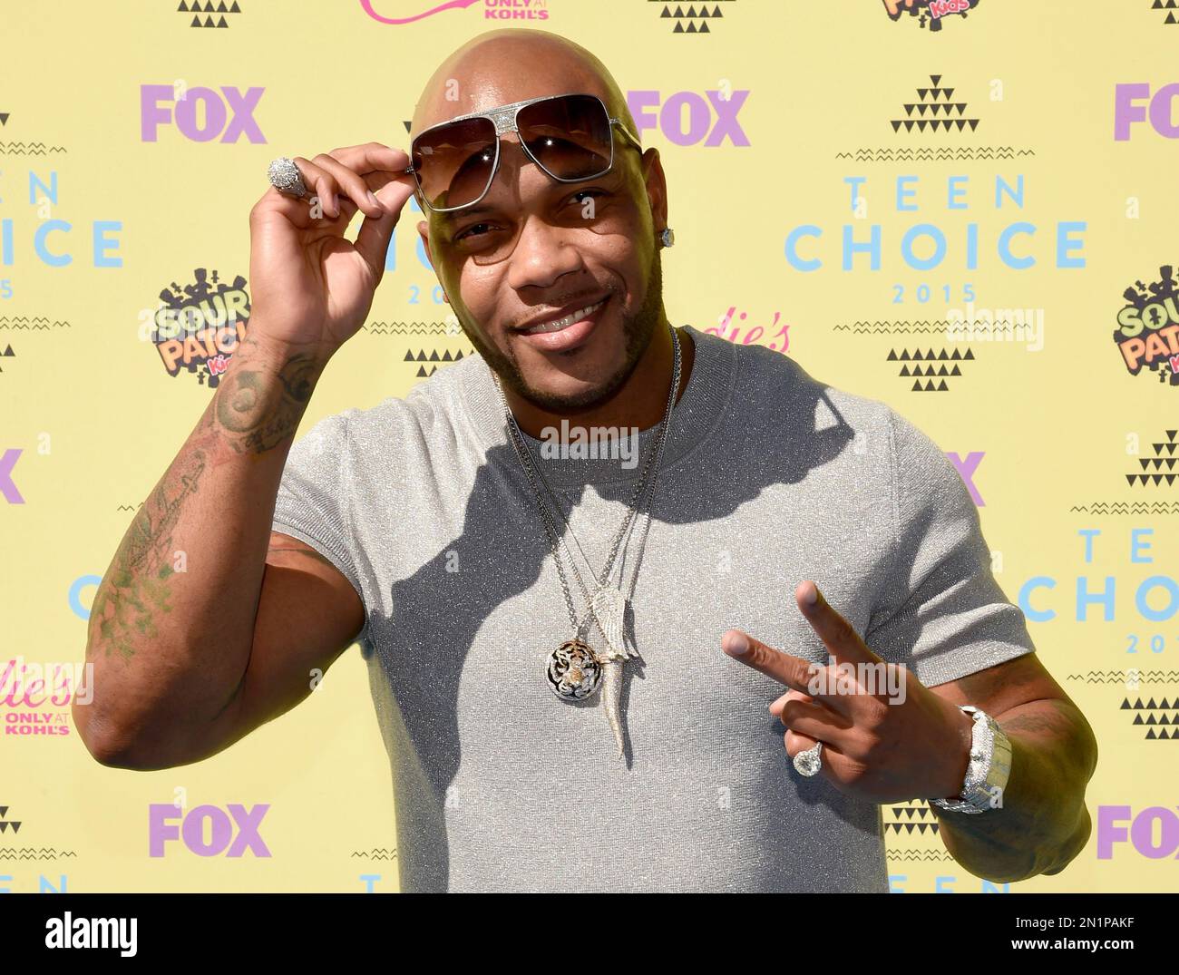 Flo Rida arrives at the Teen Choice Awards at the Galen Center on ...