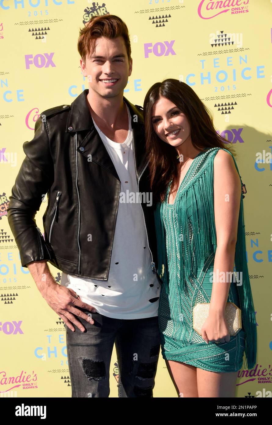 Pierson Fode, left, and Victoria Justice arrive at the Teen Choice