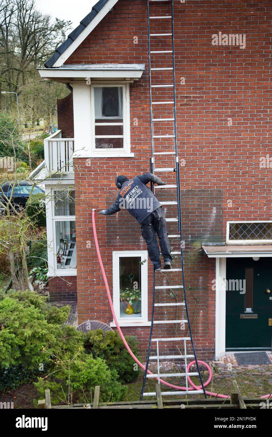 Netherlands, Cavity wall insulation is used to reduce heat loss Stock