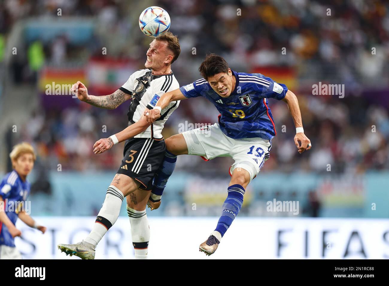 AR-RAJJAN, QATAR - NOVEMBER 23: David Raum, Hiroki Sakai  during the FIFA World Cup Qatar 2022 Group E match between Germany and Japan at Khalifa International Stadium on November 23, 2022 in Ar-Rajjan, Qatar. (Photo by MB Media) Stock Photo