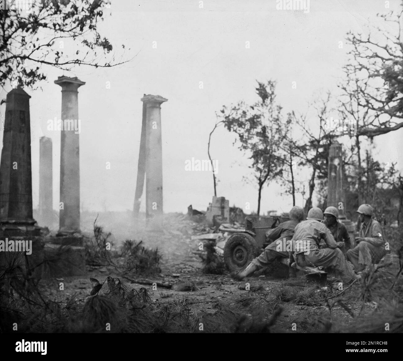 In this photo provided by the U.S. Marines, Marines operate a 37mm gun ...