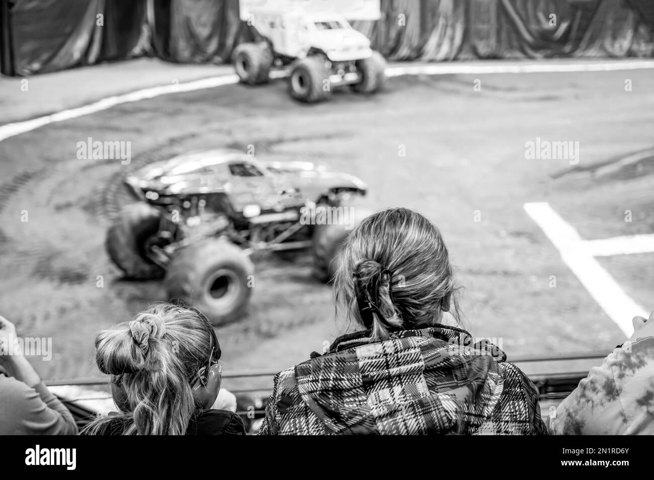 Selective focus on spectators in the stands with hearing protection