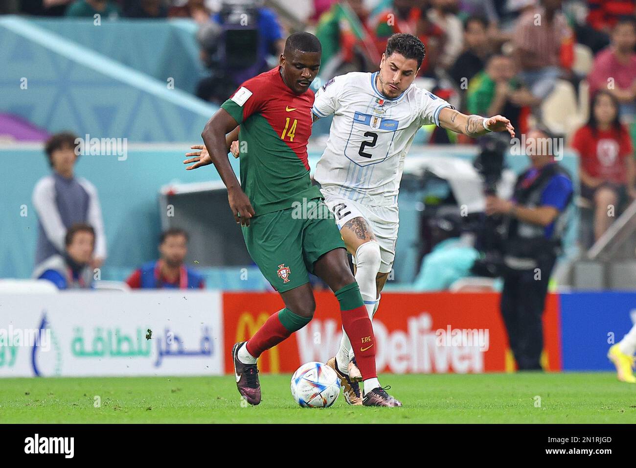 LUSAIL CITY, QATAR - NOVEMBER 28: William Carvalho, Jose Maria Gimenez  during the FIFA World Cup Qatar 2022 Group H match between Portugal and Uruguay at Lusail Stadium on November 28, 2022 in Lusail City, Qatar. (Photo by MB Media) Stock Photo
