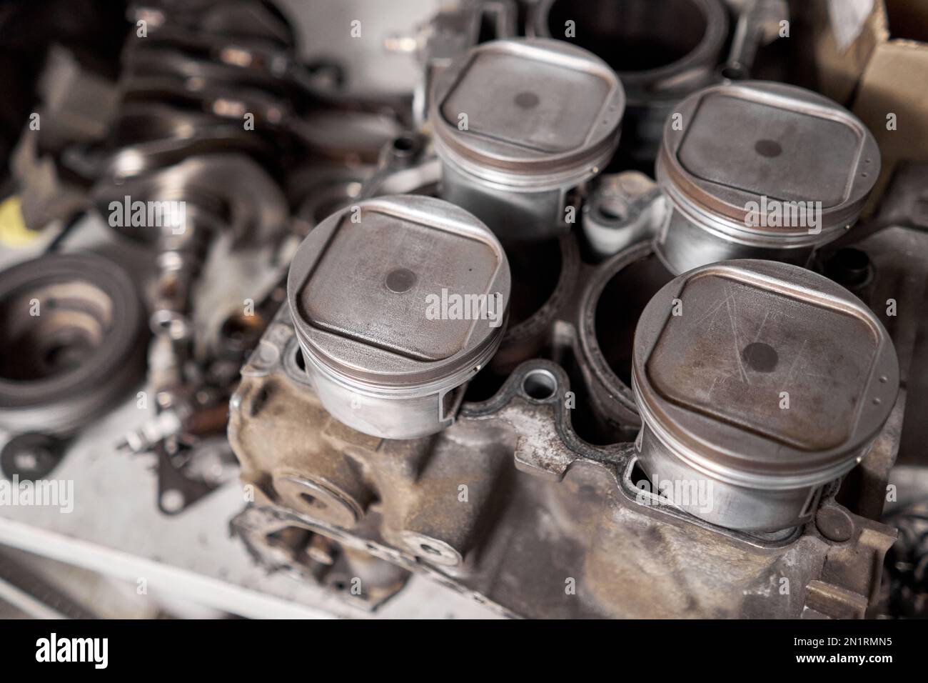 Many tools and auto spare parts car at a car repair shop. Car parts for