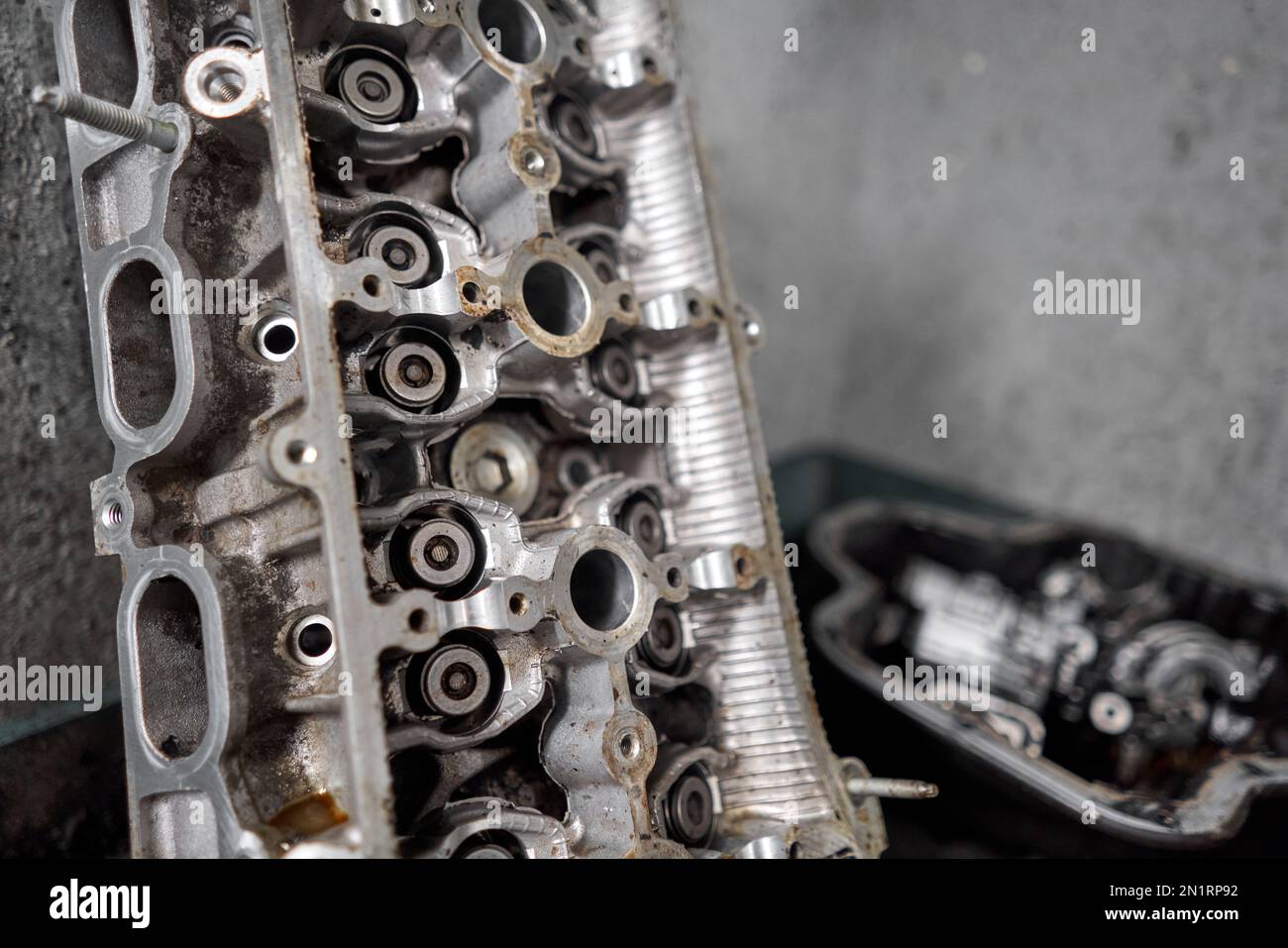 Many tools and auto spare parts car at a car repair shop. Car parts for