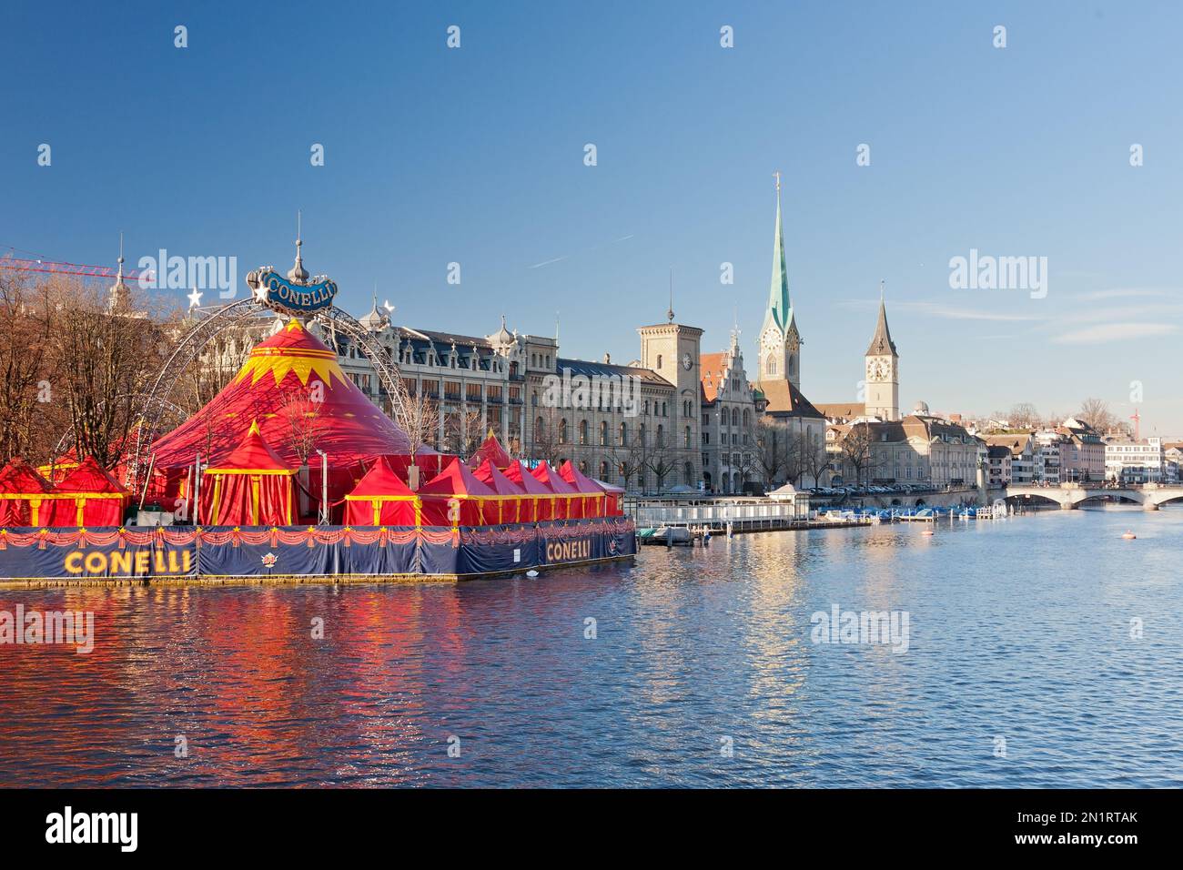 View from the Quai Bridge on the River Limmat with the Bauschänzli, Christmas circus Conelli, Zurich, Switzerand Stock Photo