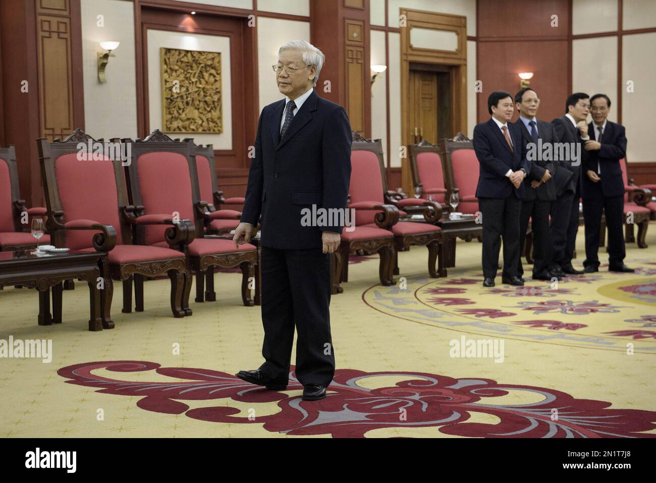 CORRECTS MONTH - Vietnam’s General Secretary Nguyen Phu Trong waits to greet U.S. Secretary of State John Kerry before a meeting at the Vietnamese Communist Party headquarters in Hanoi, Vietnam Friday, Aug. 7, 2015. (Brendan Smialowski/Pool Photo via AP) Stock Photo