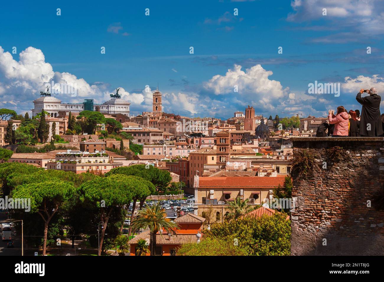 Tourism in Rome. Tourists and visitors taking photos from Aventine Hill panoramic terrace Stock Photo
