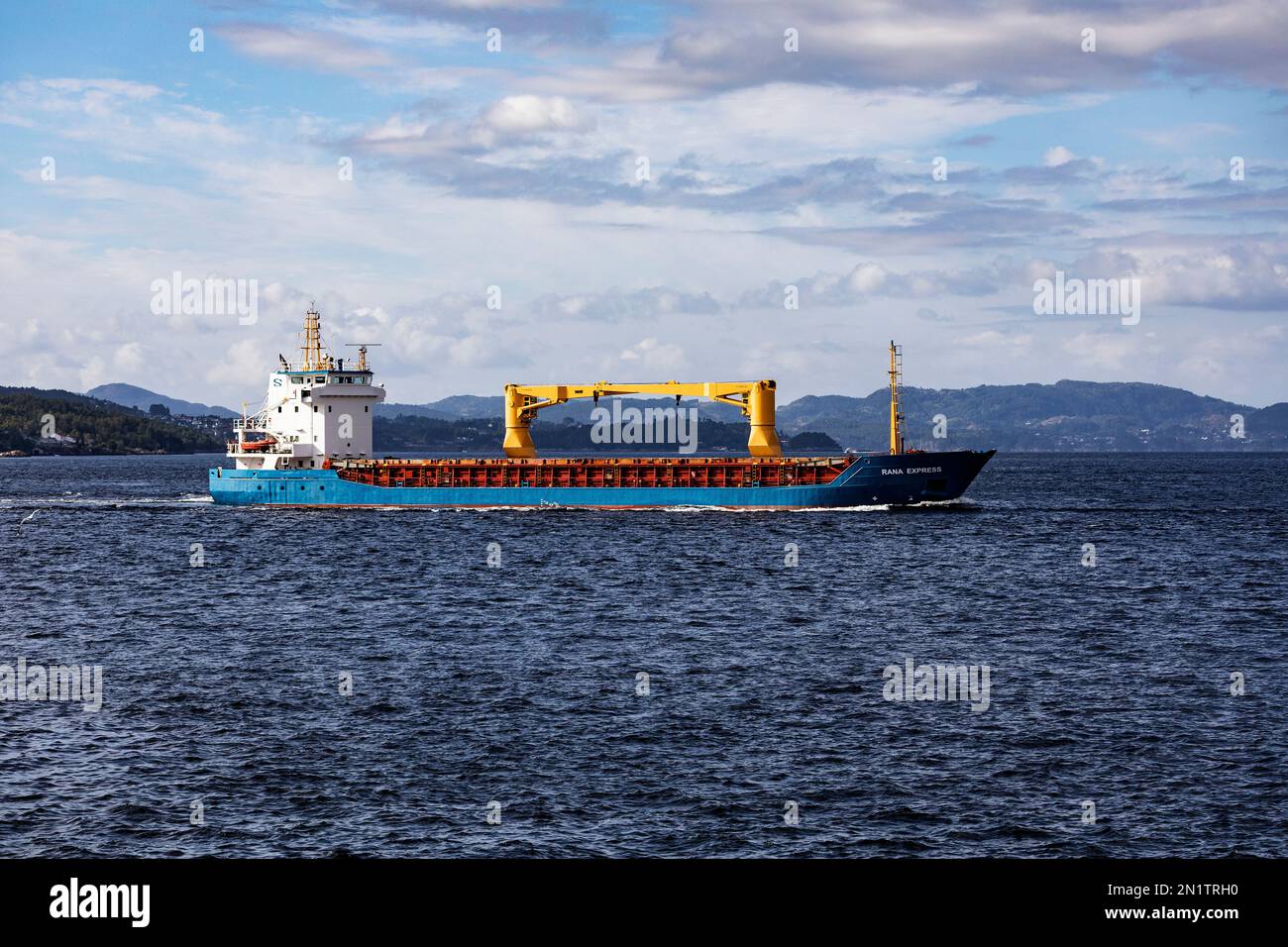 Small cargo vessel Rana Express at Byfjorden, arriving in the port of Bergen, Norway Stock Photo