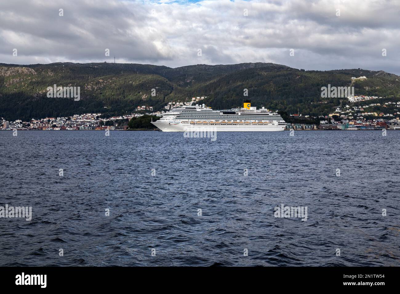 Cruise ship Costa Fascinosa at Byfjorden,  departing from port of Bergen, Norway. Stock Photo