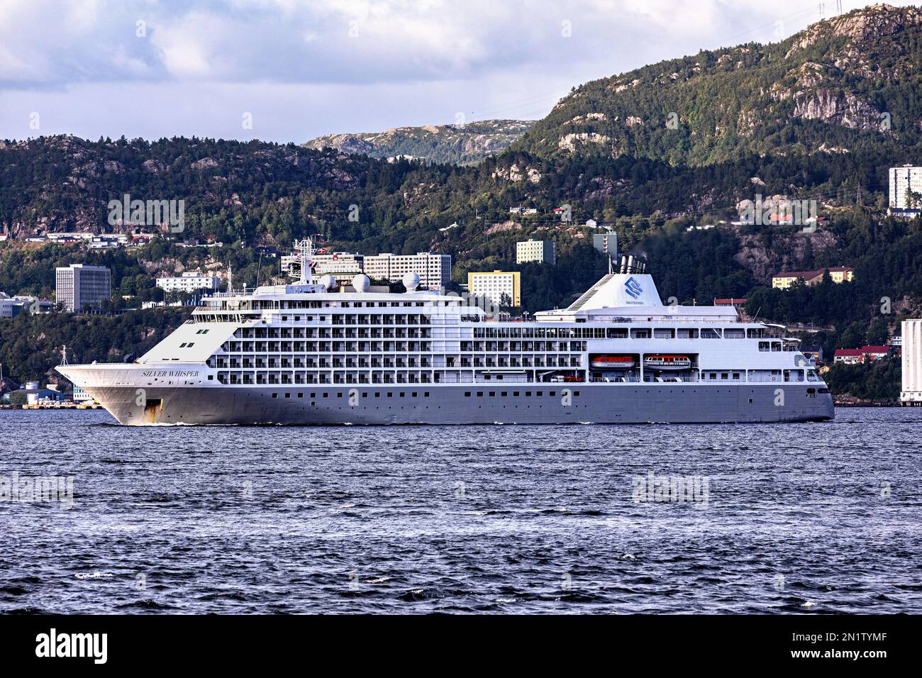 Cruise ship Silver Whisper at Byfjorden,  departing from port of Bergen, Norway. Stock Photo