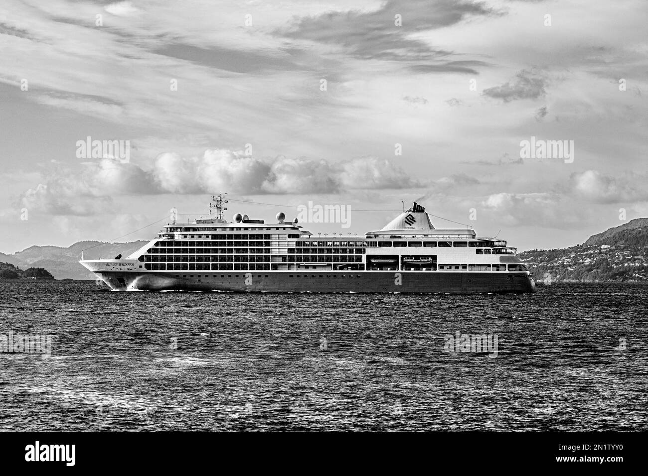 Cruise ship Silver Whisper at Byfjorden,  departing from port of Bergen, Norway. Stock Photo