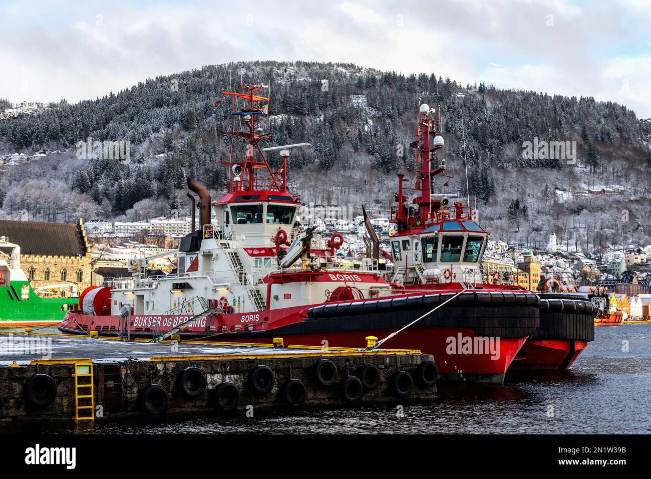 Tug boats Boris and BB Supporter alongside in the port of Bergen, Norway. Stock Photo