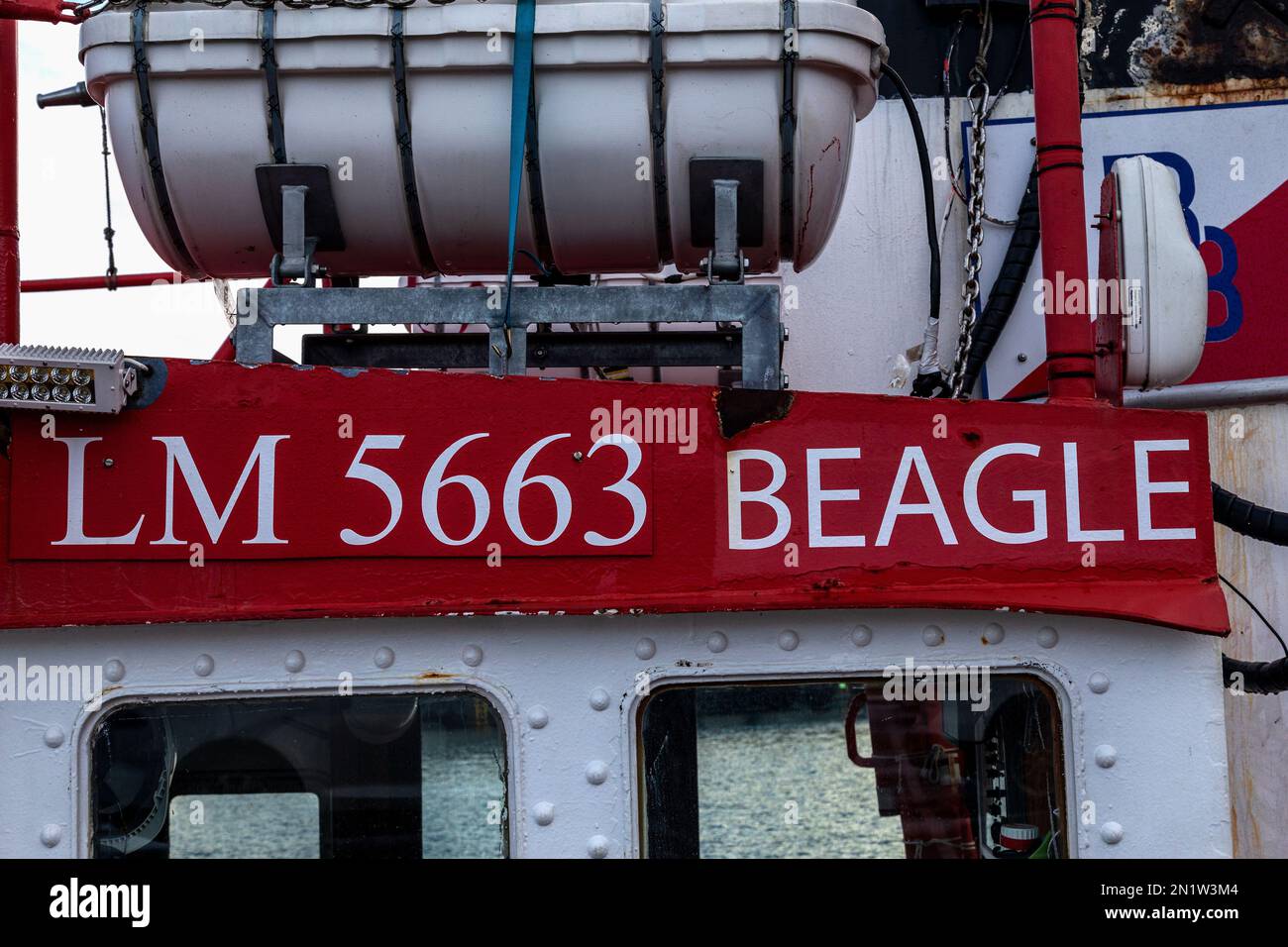 Vessel name and hull details of veteran tug boat Beagle moored in the port of Bergen, Norway. Stock Photo