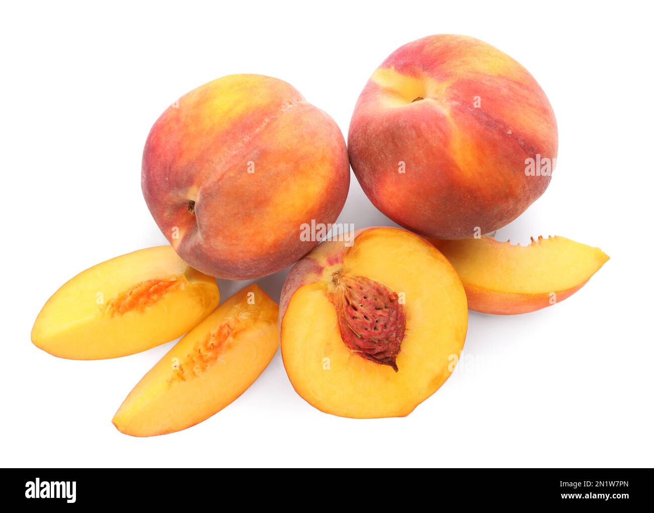 Whole and cut ripe peaches isolated on white, top view Stock Photo - Alamy