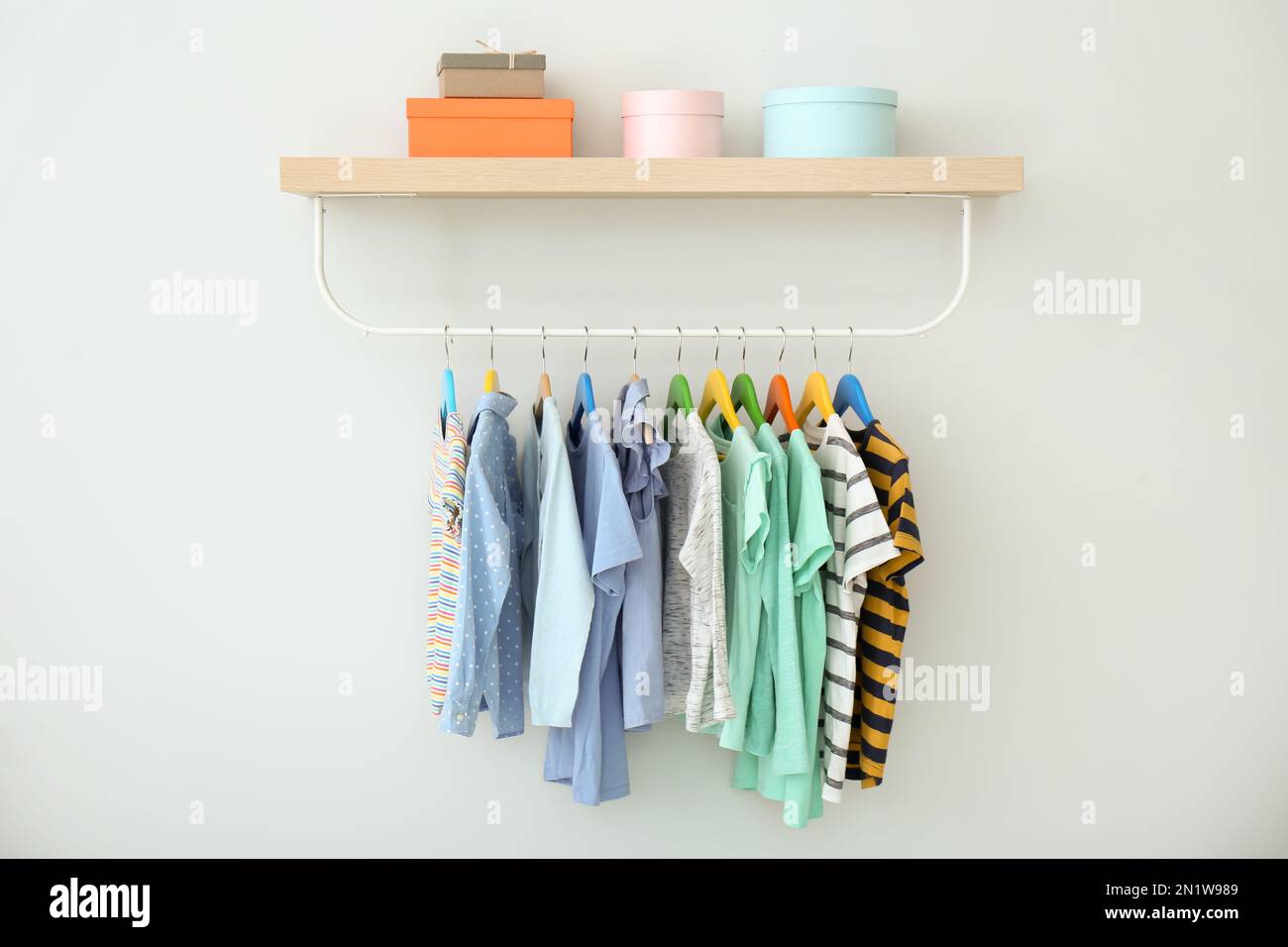 Clothes hangers child wardrobe hi-res stock photography and images