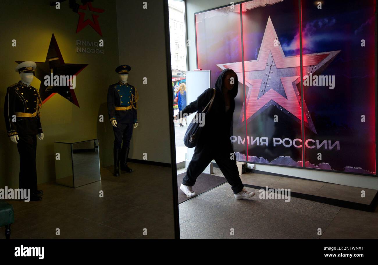In this Tuesday, July 21, 2015 photo a woman enters the Russian Army