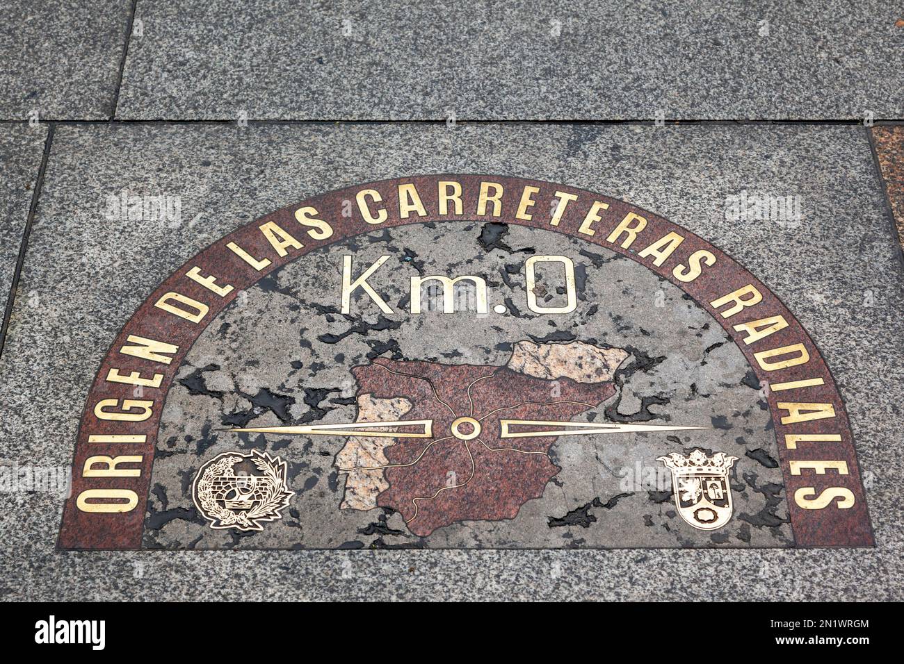 The Kilometer Zero Plaque in Puerta del Sol, Madrid, Spain. It marks the origin of the six biggest national radial highways that start from Madrid. Stock Photo