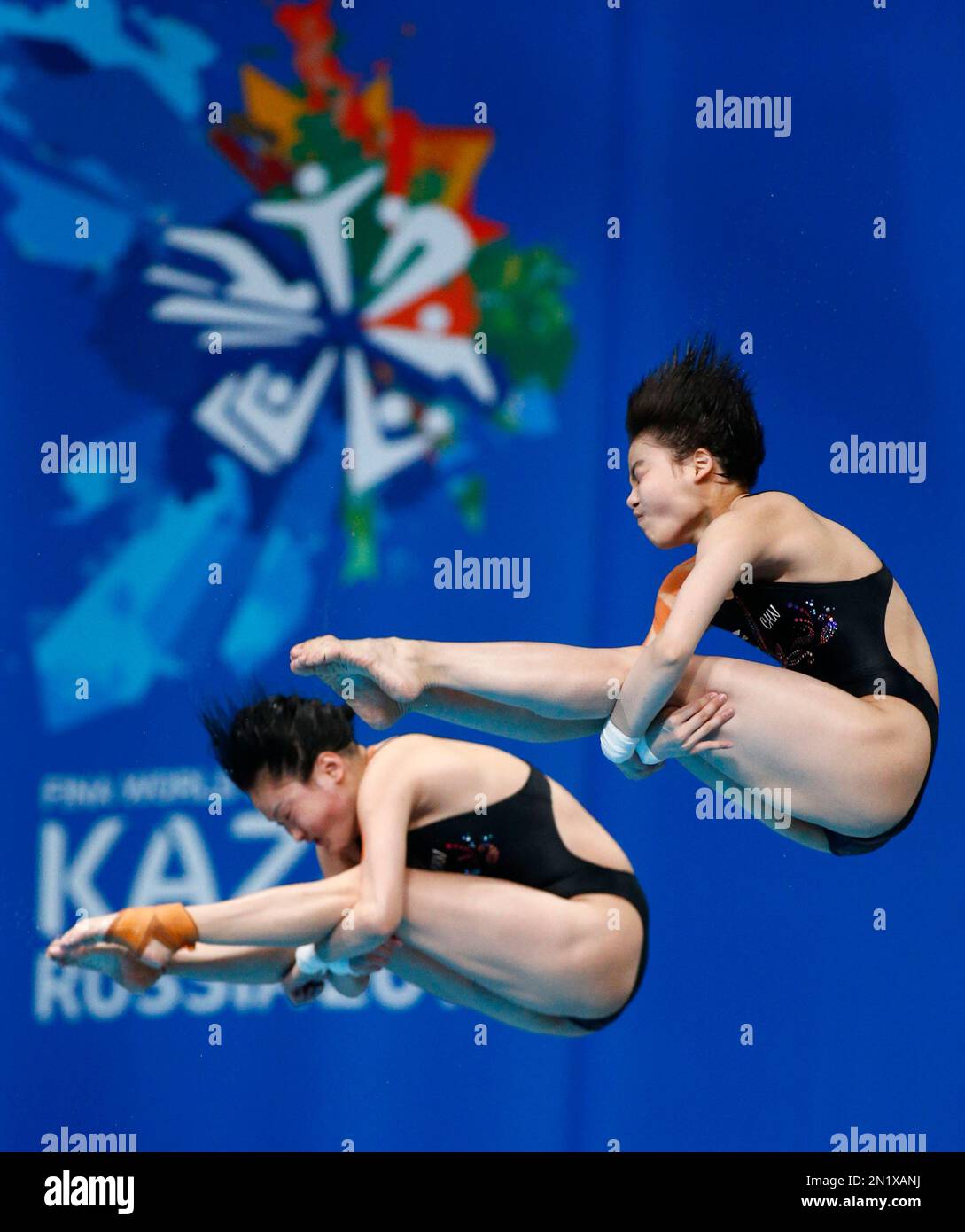 China’s gold medalists Chen Ruolin and Liu Huixia compete during the ...