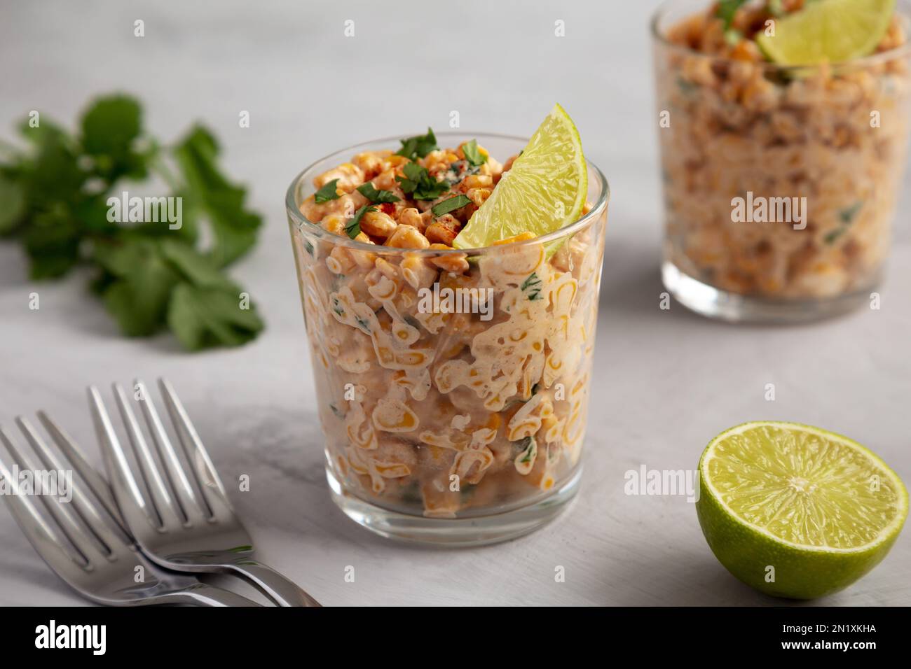Homemade Mexican Corn Elote Esquites in Cups, side view. Closeup Stock