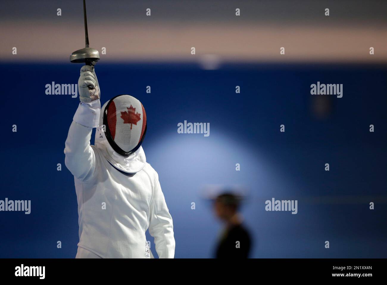 Canada's Alexis Rudkovska thrusts her epee into the air between points