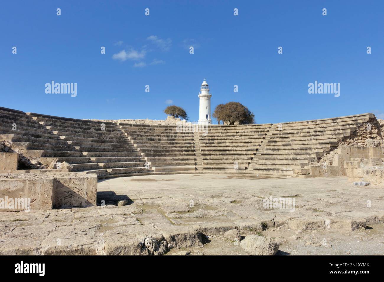 Odeon Amphitheatre And The Lighthouse. Paphos, Cyprus. This is an UNESCO World Heritage site Stock Photo