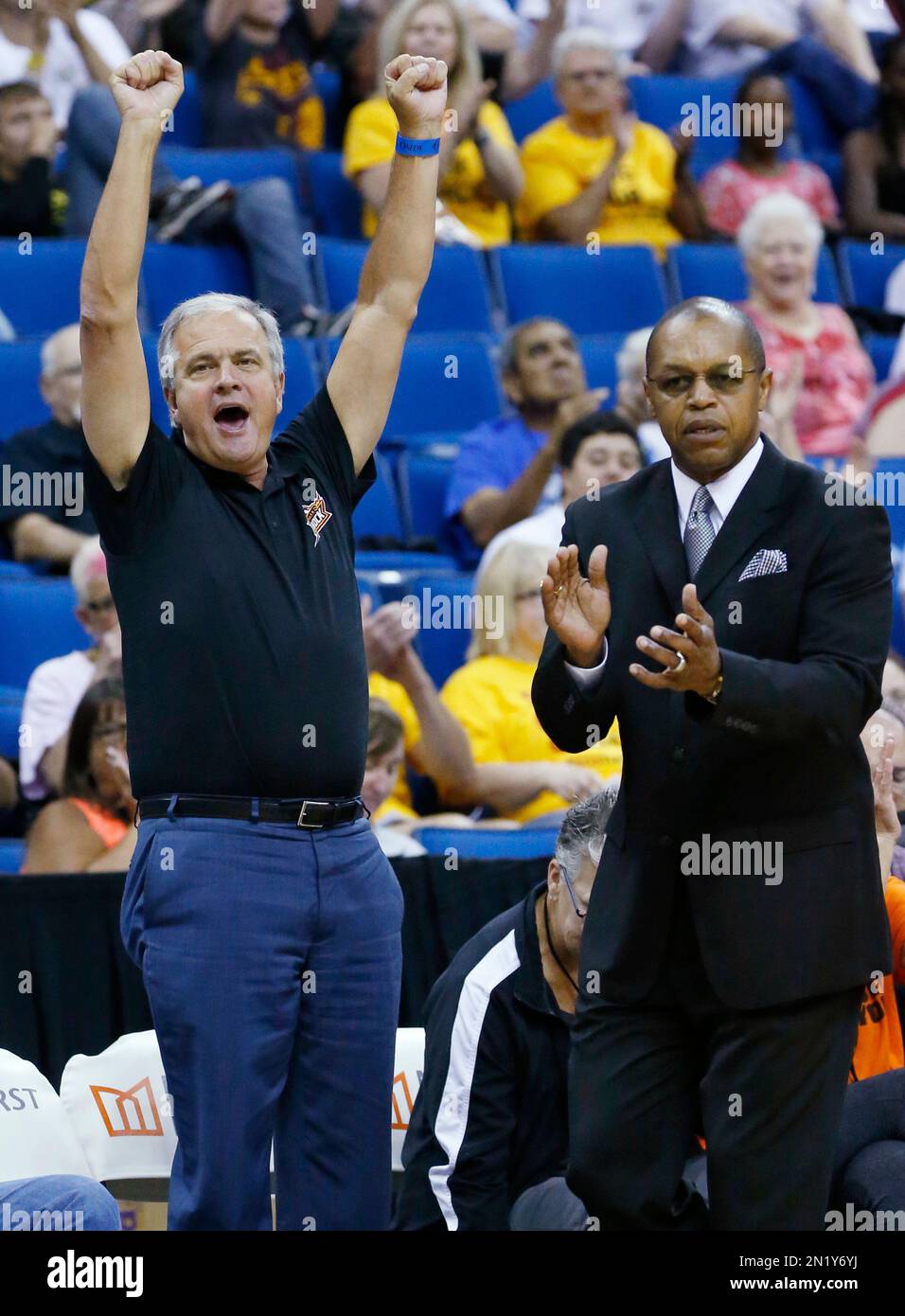 Stuart Price, left, one of the minority owners of the Tulsa Shock