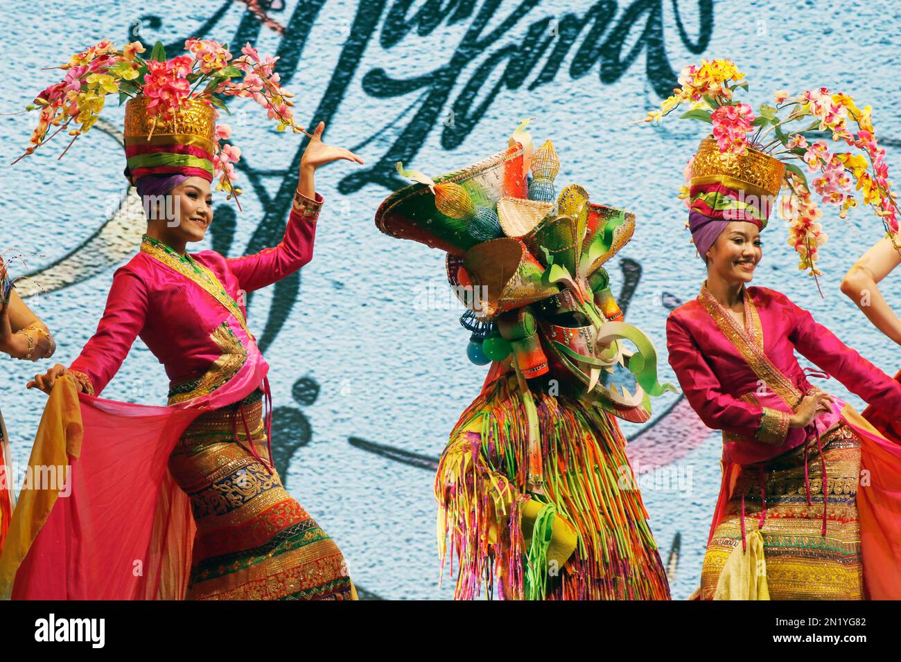 Dubai, United Arab Emirates - March 15, 2022 thai traditional dancers with colorful authentic costume in a stage Stock Photo