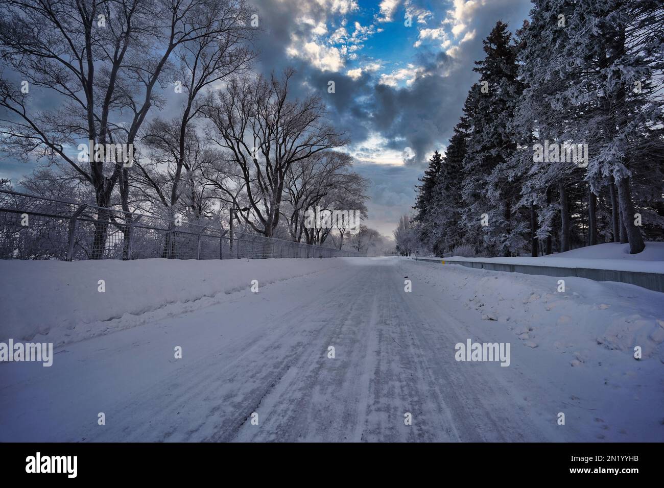 Snow covered road in sub-zero weather Stock Photo