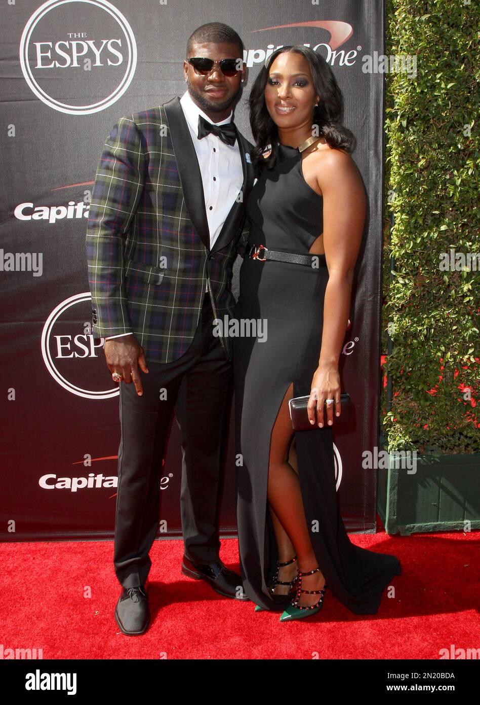 NFL player Devin Hester, of the Atlanta Falcons, left, and Zingha Hester arrive at the ESPY