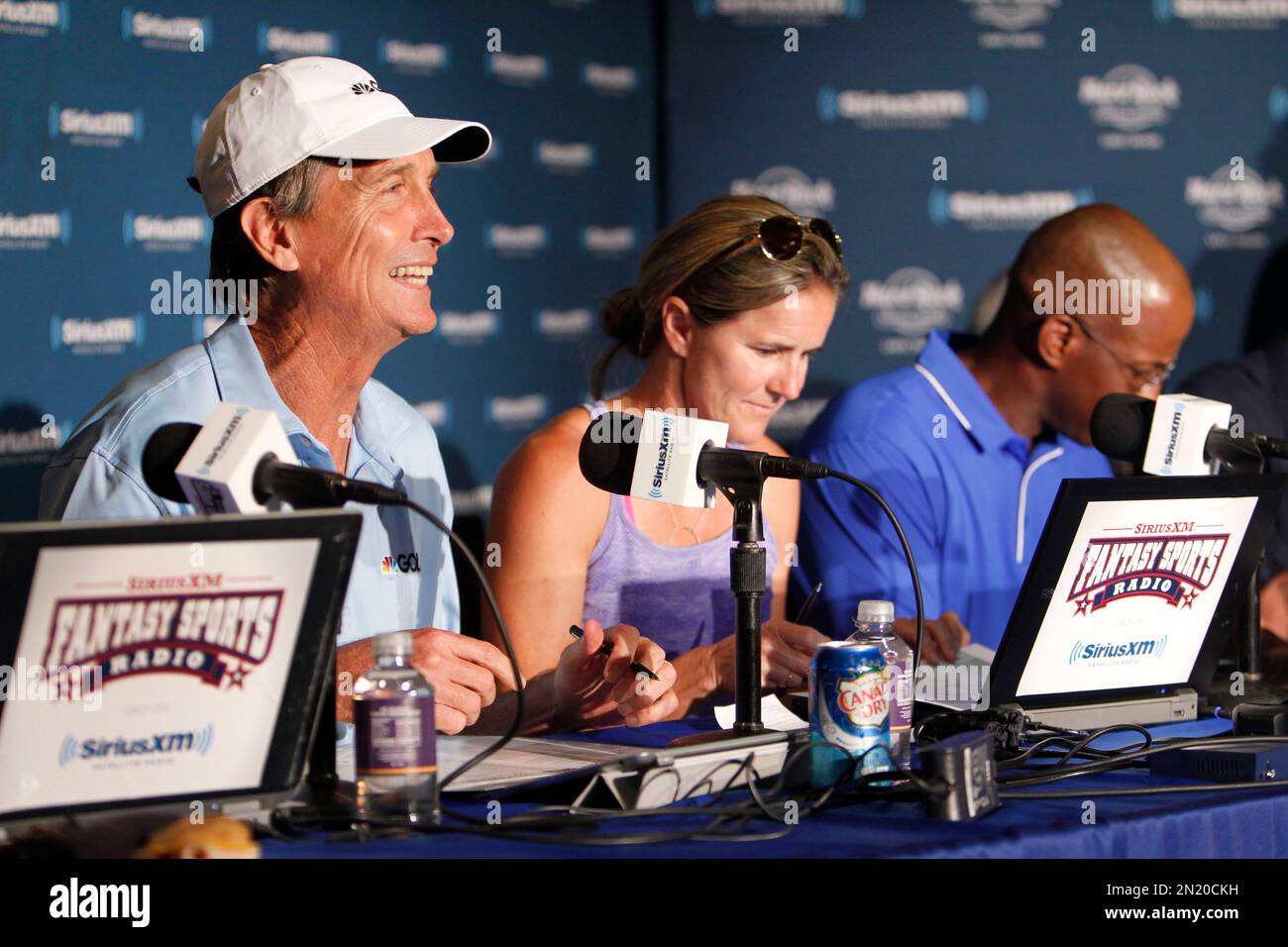 Cris Collinsworth, Brandi Chastain, and Fred McGriff, left to right