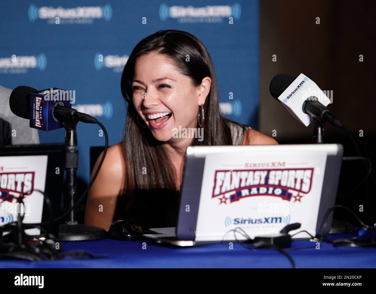SiriusXM radio host Pilar Lastra makes a pick during the SiriusXM