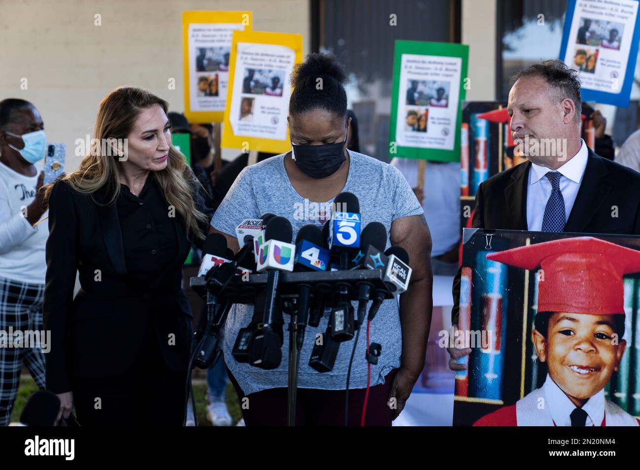 Flanked by her attorneys, Annee Della Donna, left, and Eric Dubin