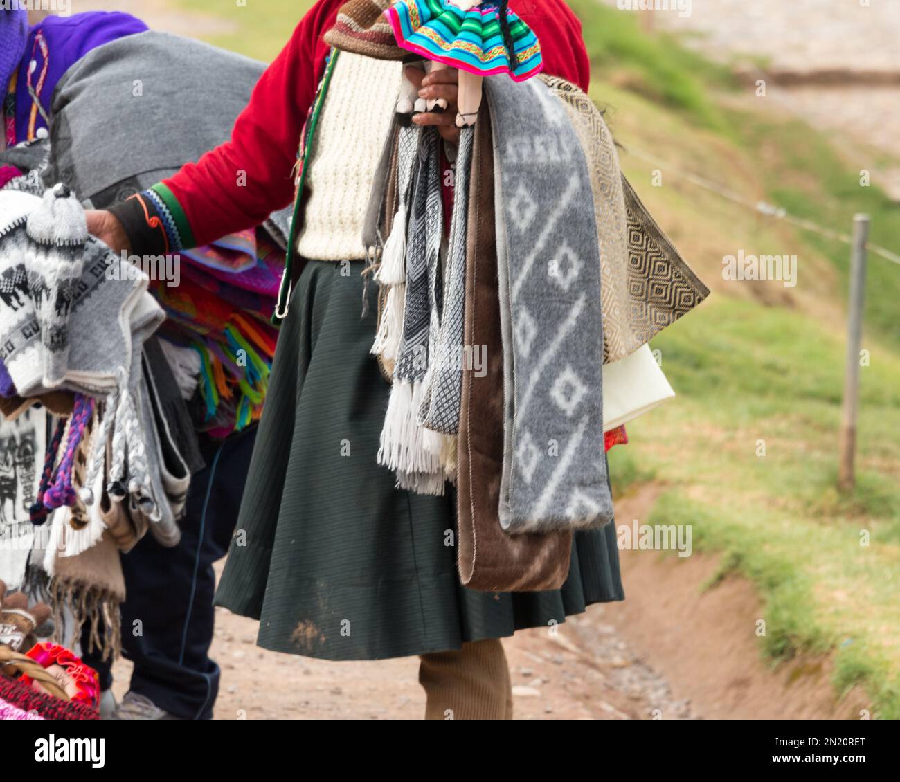 Scarves and other hand-woven alpaca wool clothing sold by a street vendor Stock Photo